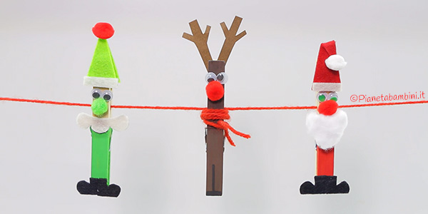 Babbo Natale, renna ed elfo con mollette di legno come lavoretto di Natale
